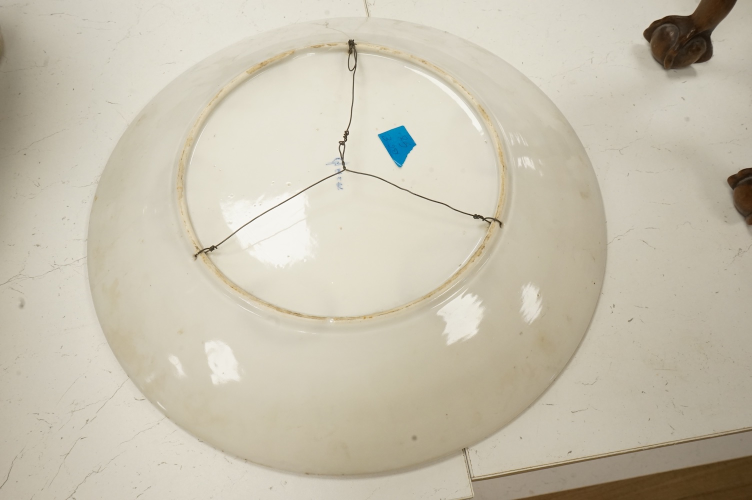 A large Japanese polychrome porcelain dish, by Fukagawa, 45cm diameter